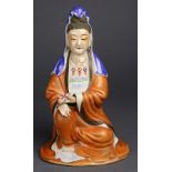 A Chinese Ceramic Seated Figure of Guanyin