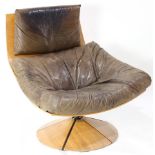 A Gerard Van Den Berg (Dutch b. 1947) swivel lounge chair