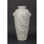 A White Glazed Chinese Porcelain Plum Vase