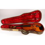 A full size violin labeled Eugene Gartner and initialed E.G upper block