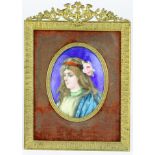 A framed French Limoges enamel portrait plaque of lady