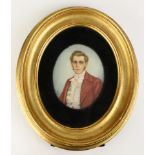 A framed miniature portrait of a gentleman