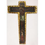 A Spanish Revival partial gilt and and paint decorated cross