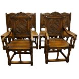 A group of Jacobean style oak dining chairs