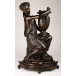 A patinated bronze figural sculpture after Auguste Moreau