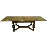 A Jacobean style draw leaf dining table