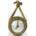 An antique "jeweled" gilt brass mounted wall clock, retailed by M. J. Tobias & Co.