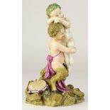 A German porcelain figural Bacchnalian group