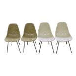 A group of Charles and Ray Eames fiberglass side shell chairs