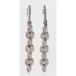 Pair of diamond, 14k white gold earrings