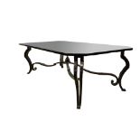 A Moderne wrought-iron glass top lower table