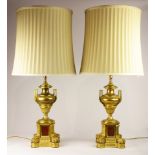 A Pair of French ormolu mounted urn form lamps