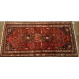 A Persian Hamadan carpet