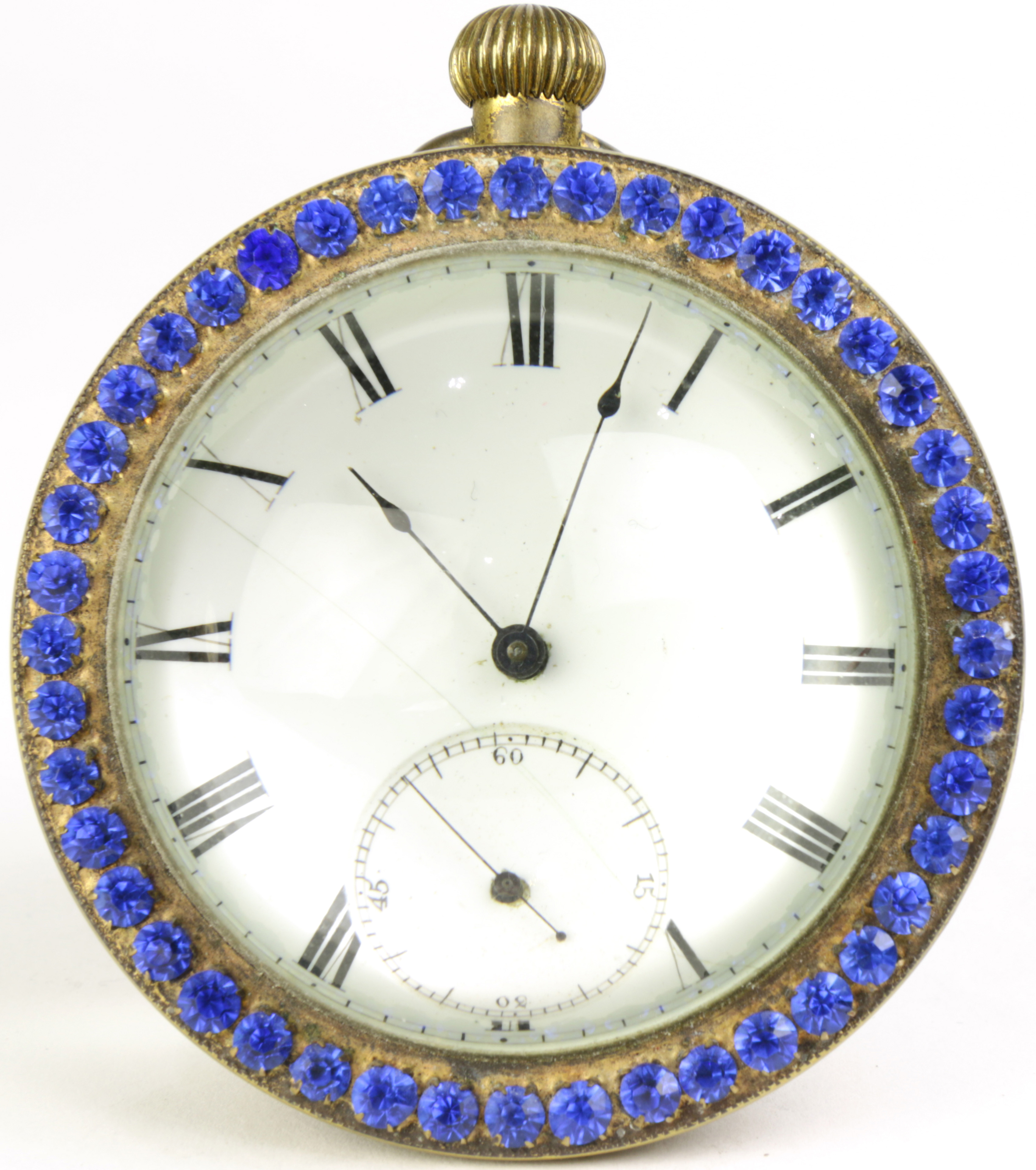 An antique "jeweled" brass mounted paperweight desk clock