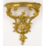 A French Rococo style ormolu bronze wall bracket circa 1870