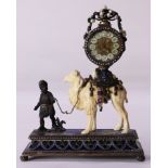 A continental emerald ruby seed pearl and eglomise decorated desk clock in the Moorish taste
