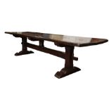 A Baroque style oak dining table