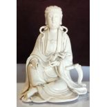Chinese blanc de chine seated figure of Guanyin