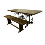 A Spanish Revival dining table and bench attributed to Monterey Furniture circa 1920