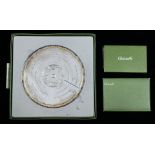 A Christofle France silverplate wine bottle coaster