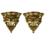A pair of Italian Rococco giltwood carved wall brackets