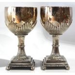 A pair of George III sterling silver goblets