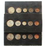 Three sets of uncirculated mint sets