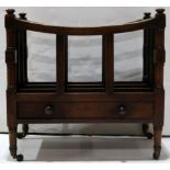 A Regency walnut canterbury