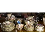 A Royal Crown Derby Imari pattern partial tea service