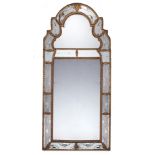 A continental ebonized and partial gilt hall mirror