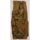 A French carved wood plaque depicting Saint Luke second half 19th century
