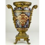 A Continental gilt bronze mounted champleve urn