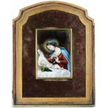 A framed Limoges enamel portrait plaque of the Madonna and Child