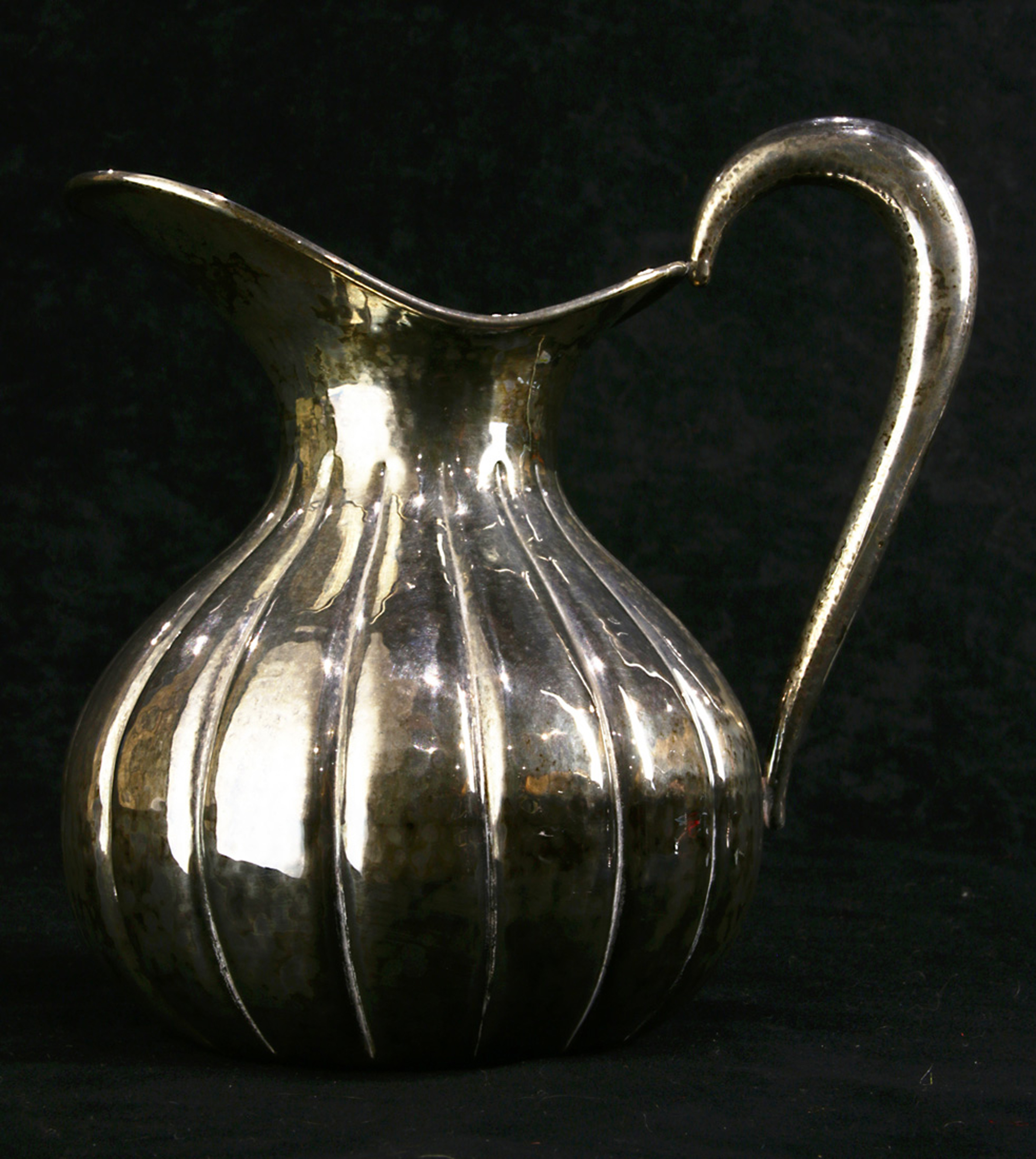 Baroque style silver water pitcher, possibly