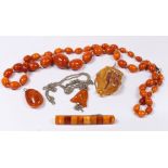 Collection of (5) amber, gold-filled, metal jewelry