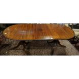 A Regency style mahogany dining table