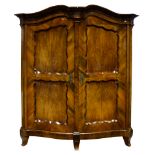 A Continental walnut armoire