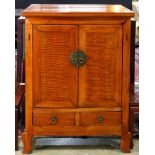 A Chinese hard wood cabinet