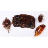 Collection of amber, gold-filled, metal jewelry and slab