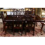 A Chippendale style dining suite