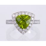 Peridot, diamond and 18k white gold ring