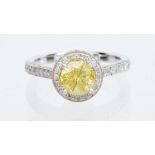 Fancy intense yellow diamond, 18k white gold ring