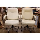 A pair of white chairs, dimensions: 43"h x 29"w