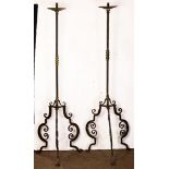 A pair of Spanish Revival wrought iron torchieres
