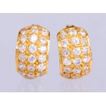 Pair of white stone, 20k yellow gold earrings