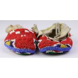 A pair of Plains child's beaded moccasins