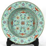 A Large Chinese Turquoise-Ground Famille Rose Basin