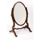A mahogany shaving mirror