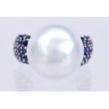 South Sea cultured pearl, sapphire, 18k white gold ring