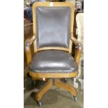 Arts & Crafts style oak and leather upholstered office chair